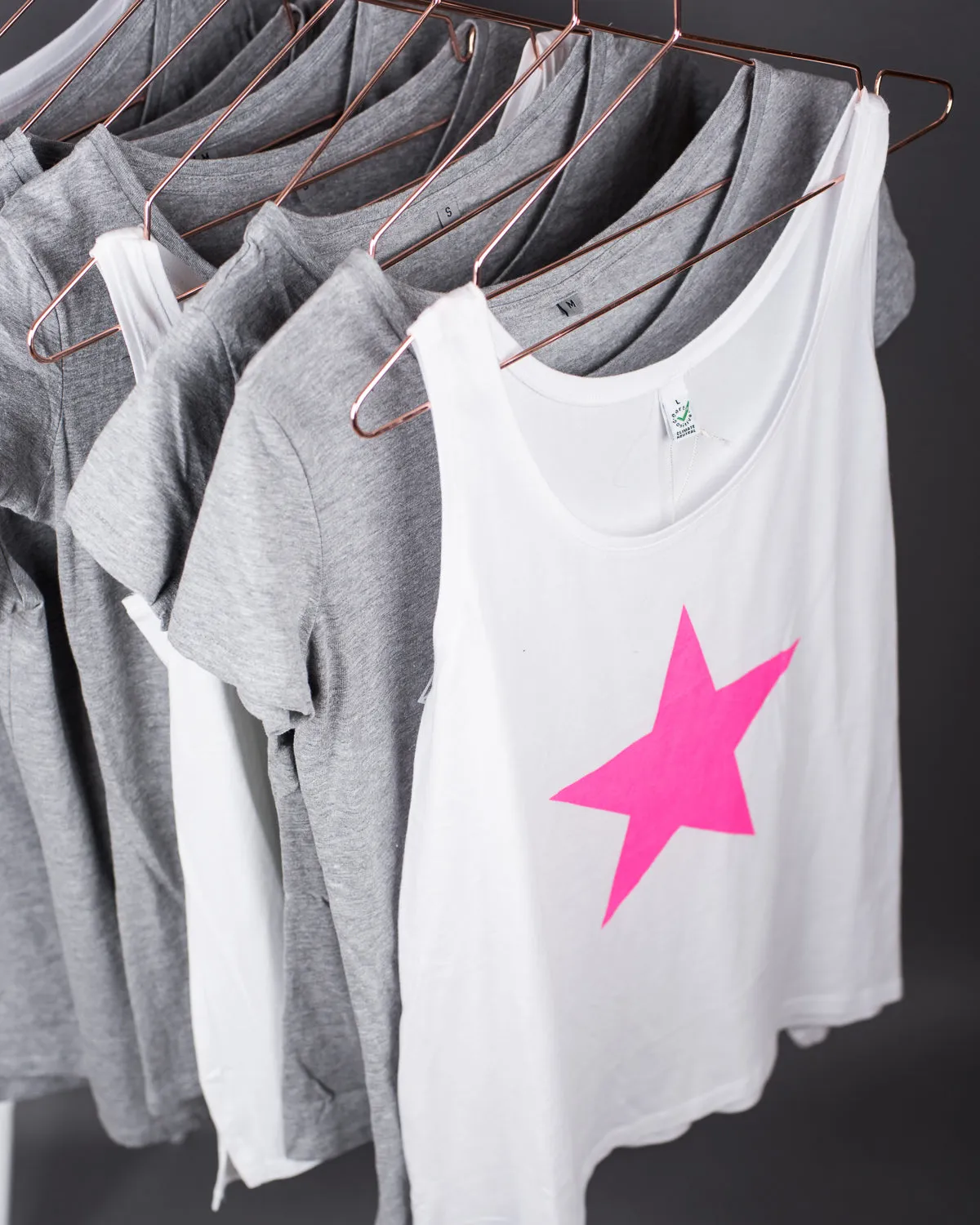 Neon pink star white vest *just 1 medium left*